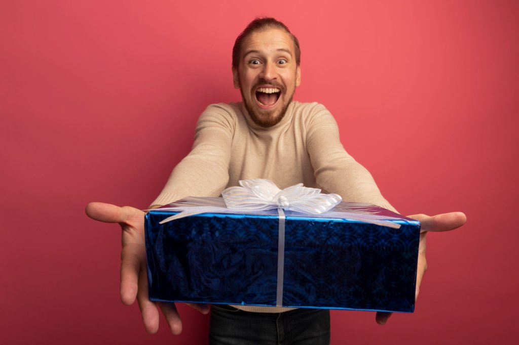 young-handsome-man-beige-turtleneck-showing-gift-box-crazy-happy.jpg young-handsome-man-beige-turtleneck-showing-gift-box-crazy-happy.jpg